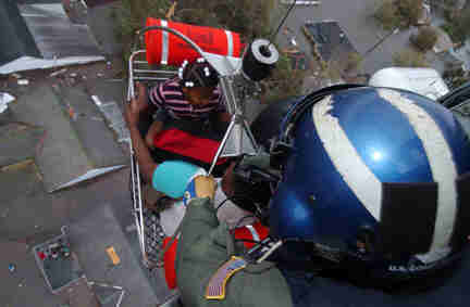 helo over katrina lifting a survivor